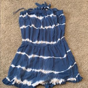 Woman’s blue and white romper